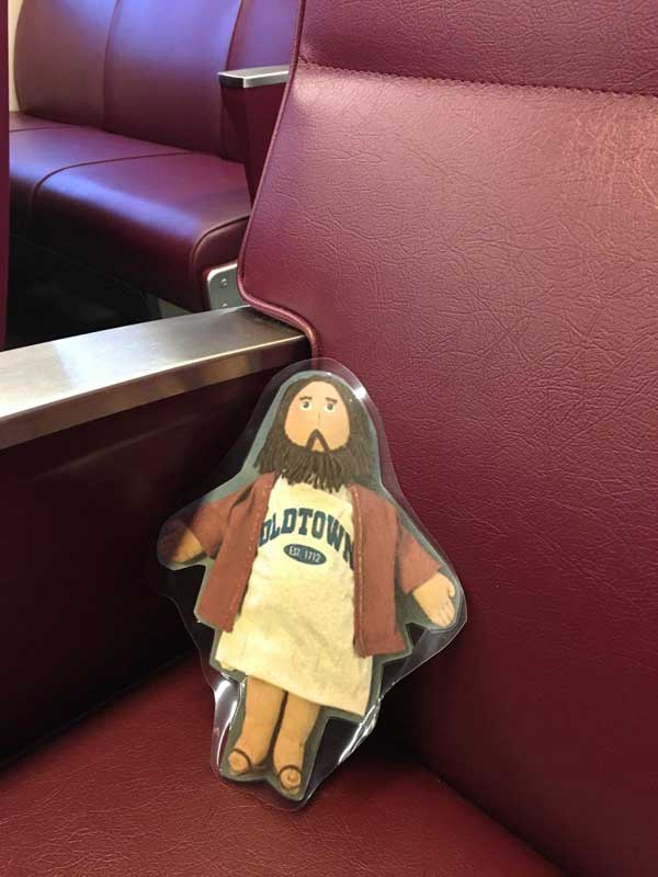 Flat Jesus Rides the Commuter Rail